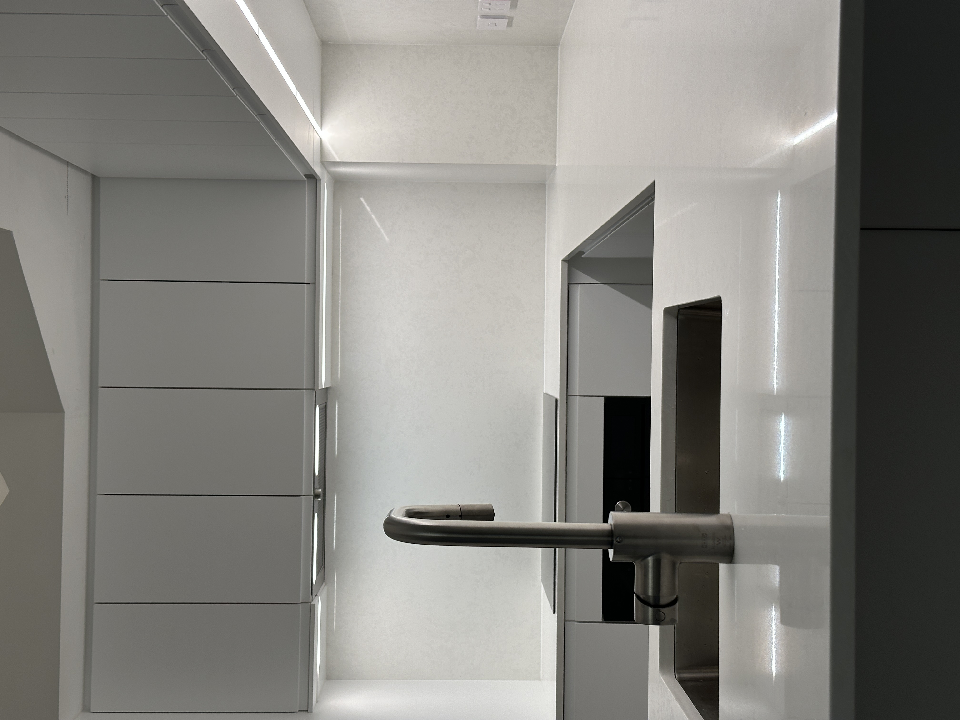 Alternate angle of minimalist family kitchen renovation